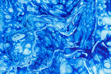 abstract background of mixed blue white paints