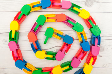 colorful rubber block toys for kids play on wooden desk