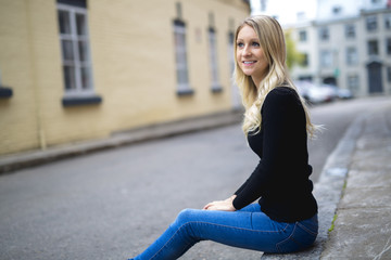 Young blond woman in Urban