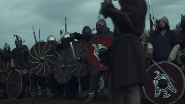 Army of Vikings Before Battle. Medieval Reenactment. Shot on RED Cinema Camera in 4K (UHD).