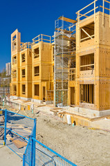 A new home under construction over blue sky in Vancouver, Canada.
