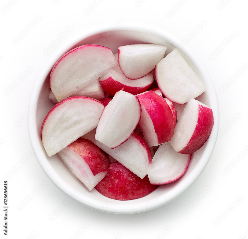 Sticker Bowl of radish lobes isolated on white, from above