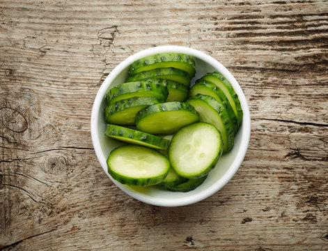 Bowl of fresh cucumber slices, from above