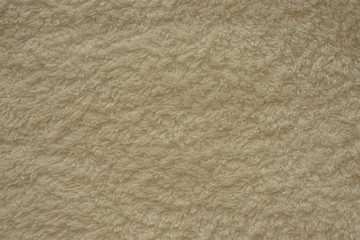 Бежевое махровое полотенце текстура. Натуральная хлопковая махровая ткань