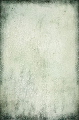 Abstract grunge background: pale rusty wall with scratches