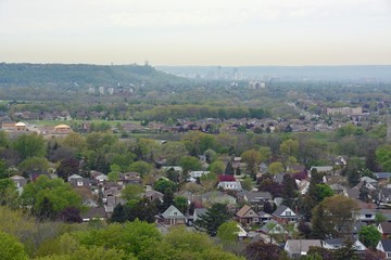 view from the Devils Punch bowl lookout point towards the  Stoney Creek community and Hamilton in the far background,  Ontario Canada