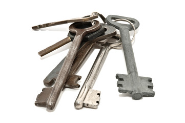 Bunch of old rusty keys, isolated on white background