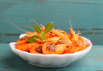 small shrimp (crustaceans) in a blue background. traditional Odessa cuisine