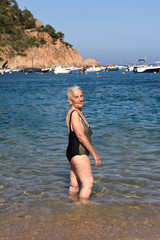 portrait of a woman entering the sea