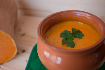 Vegetarian cream soup from a pumpkin with toasts