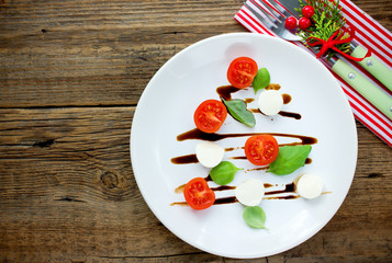 Festive Christmas appetizer caprese salad shaped Christmas tree