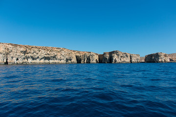 Fototapeta na wymiar Island seen from the sea with a deep blue water