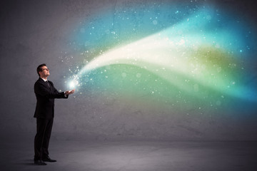 Fototapeta premium Businessman holding light