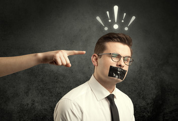 Hand pointing at business employee