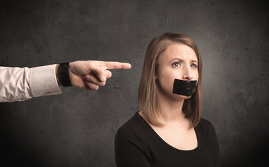 Hand pointing at woman