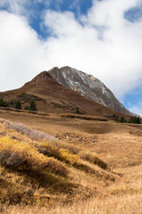 Engineer mountain with autumn brown grass and changing leaves