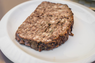 rabbit pate in white plate