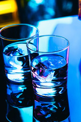 drinking glasses close-up on a dark background