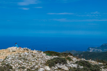 Female hiker taking a break on GR 221, Mallorca, Spain