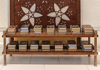 stack of books the Koran in the mosque