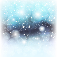 Obraz premium Winter shining backgrounds with bokeh and snow. Blue winter wallpaper.