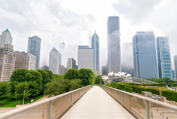 Fototapeta na wymiar Cityscape of Chicago downtown from the Nichols Bridgeway pedestrian bridge in cloudy day. 