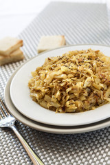 Fried cabbage with caraway and garlic on a plate