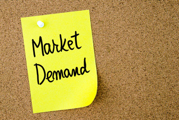 Market Demand text written on yellow paper note