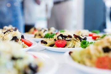 Many plates of vegetable salad