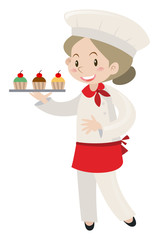 Female baker holding tray of cupcakes