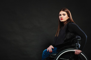 Obraz na płótnie Canvas Sad girl on wheelchair.