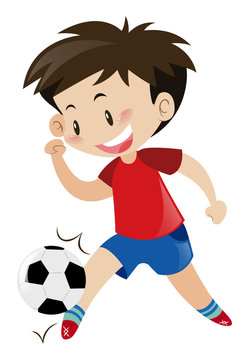 Boy in red shirt playing football