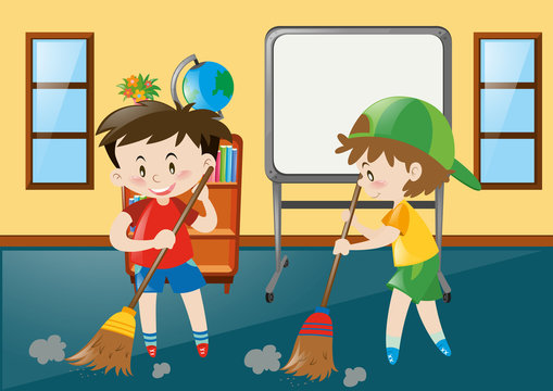 Two boys sweeping classroom floor