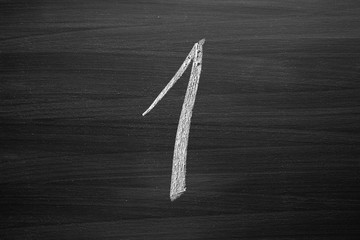 number one enumeration written with a chalk on the blackboard