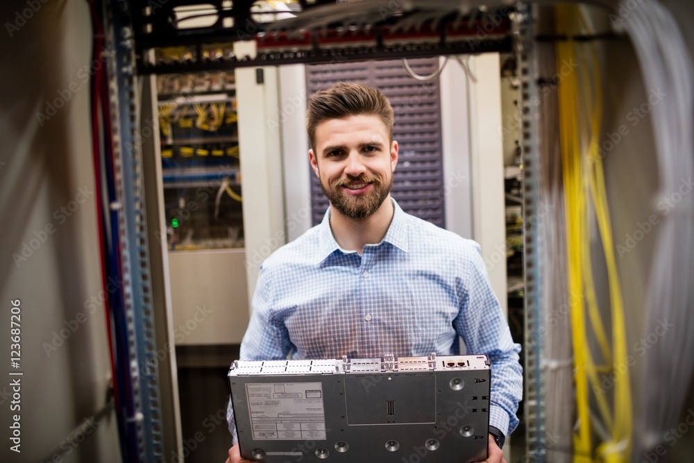 Aufkleber Technician removing server from rack mounted server
