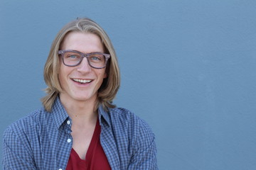 Young Man With Eyeglasses Smiling with Copy Space for Text 