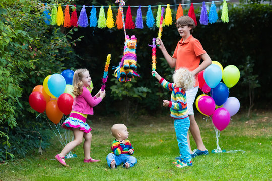 Kids Playing With Birthday Pinata