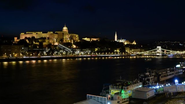 Night time lapse of the Royal Palace and Danube river in Budapest. Buda Castle.