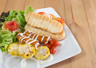 hotdog with ketchup mustard and vegetable