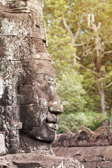 Massive stone carving faces of Bayon temple in Angkor Thom, Siemreap, Cambodia