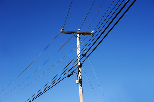 power pole under blue sky