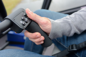 Hand on steering controls