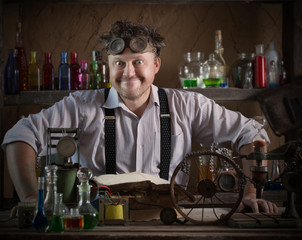 crazy medieval scientist working in his laboratory