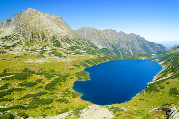 amazing view on Great Pond in Five Lakes Valley in polish Tatra mountain, Poland © lukaszimilena
