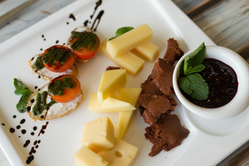 Cheese and tomato appetizer on a table