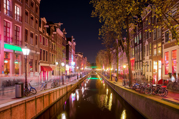 Fototapeta premium Red light district in Amsterdam, Netherlands at night. Nightlife