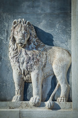 Marble lion on church facade