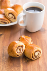 Mini cinnamon buns and coffee.