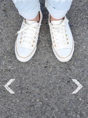 White casual shoes making decision