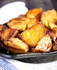 Baked potato wedges with garlic, christmas garnish